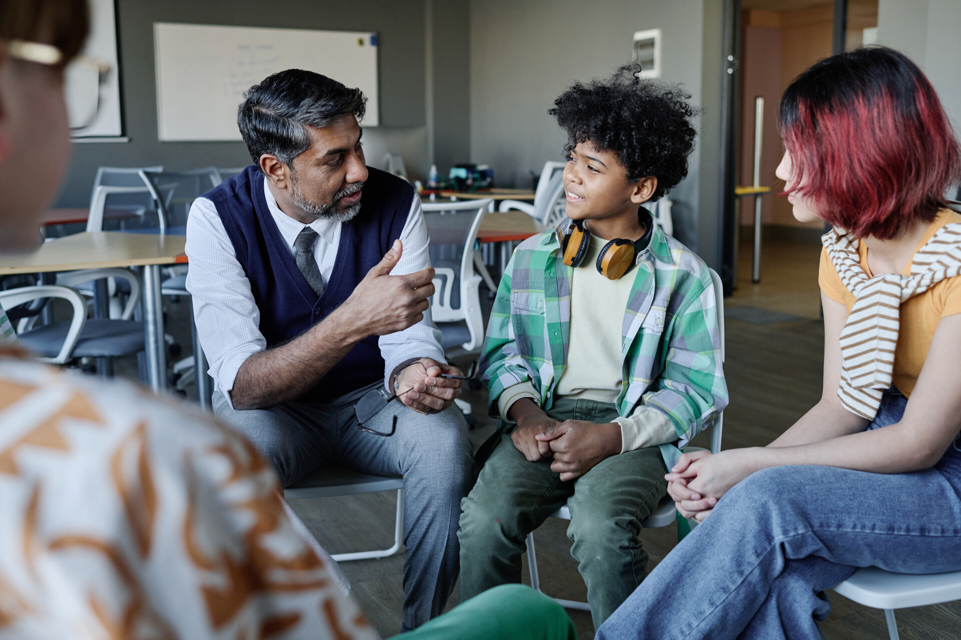 Youths gathered in group therapy session